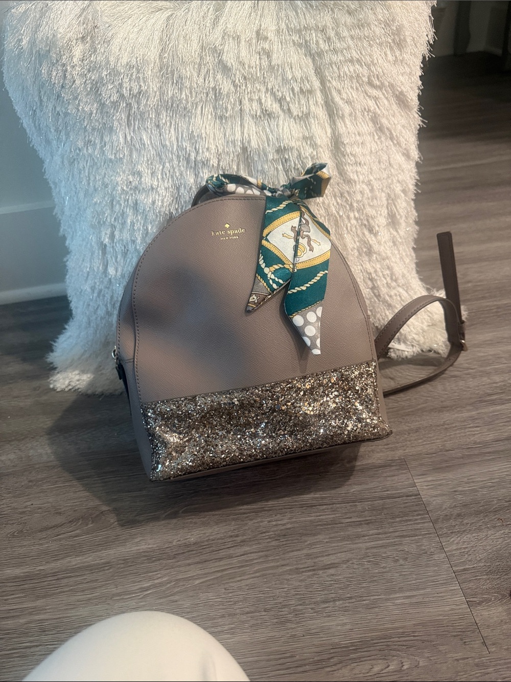 Kate Spade taupe backpack with gold glitter trim